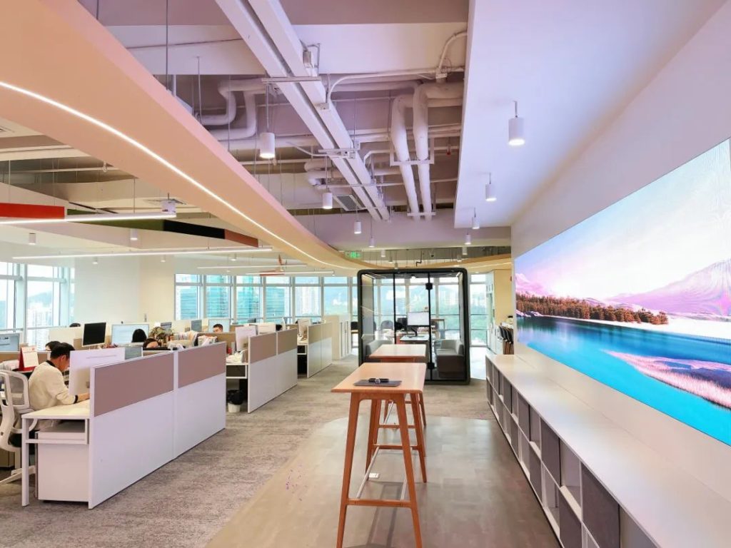 Shenzhen office interior with panoramic windows and LED display